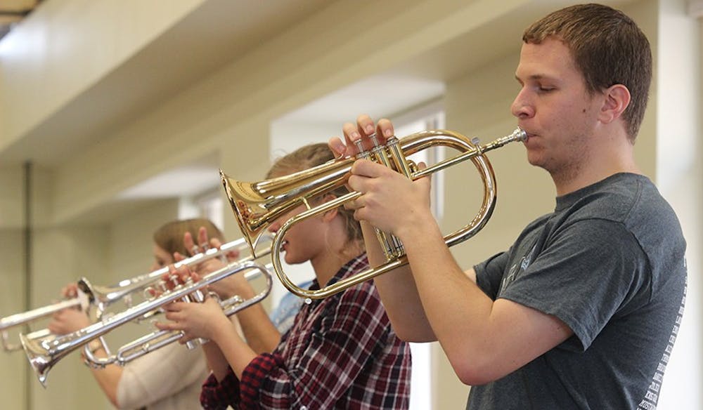 UNC students of the Department of Music practice for the upcoming Carolina Jazz Festival in conjunction with Jazz Week at Carolina, February 19th through the 23rd. The student ensemble is conducted by James Ketch, the Director of Jazz Studies and trumpet instructor at the university. 