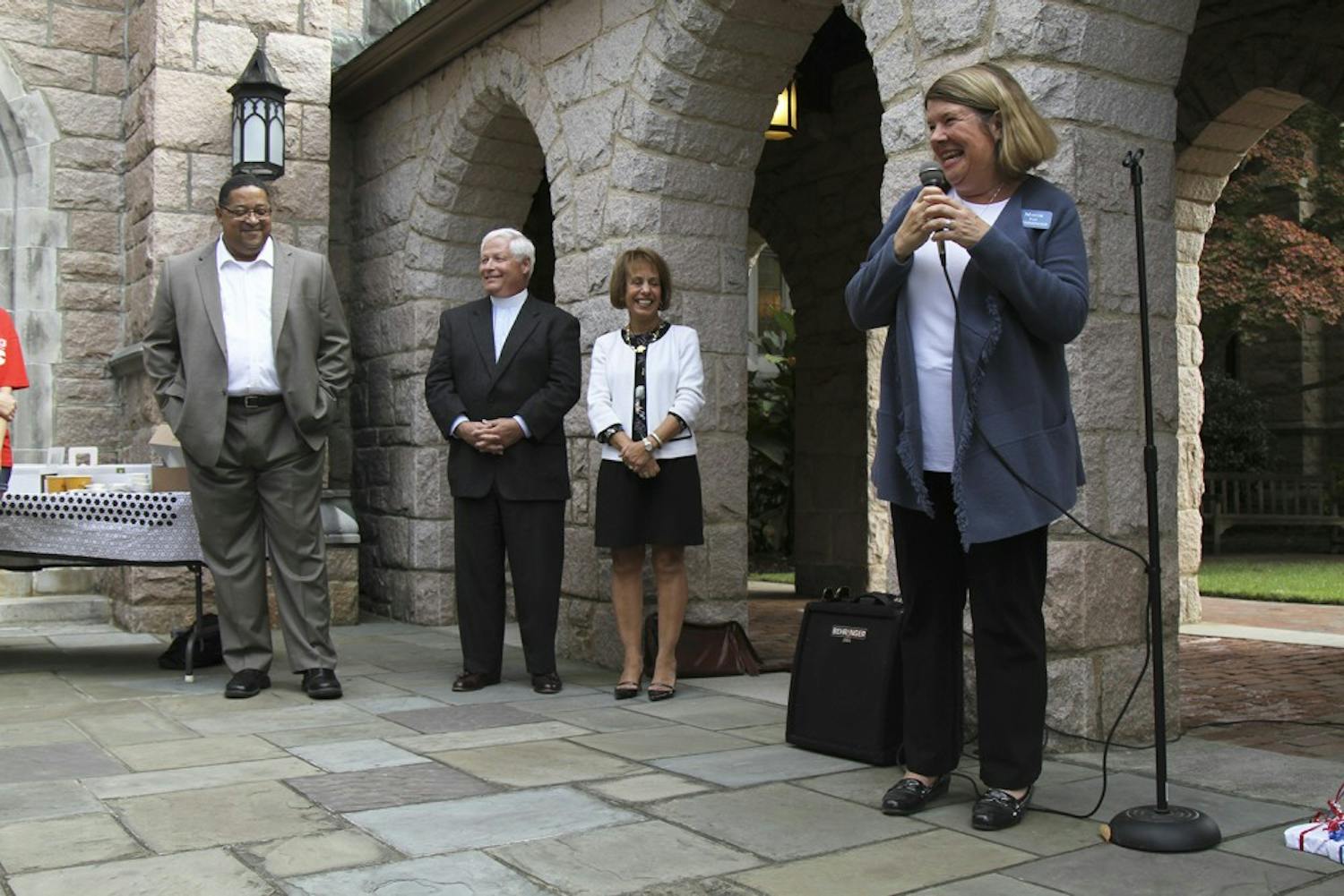 Chapel Hill Mayor Pam Hemminger (right) made statements at the Chapel of the Cross before she casted her vote Thursday.