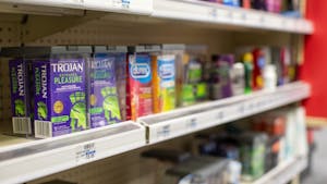 The CVS on Franklin Street's "family planning" aisle offers a number of contraceptives for purchase. Contraceptives like condoms can help decrease the risk of contracting sexually transmitted infections and lower the risk of pregnancy.