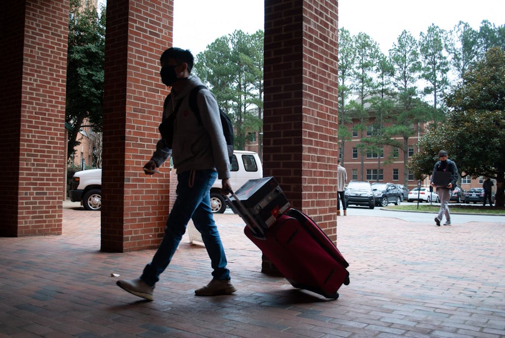 Students return to on-campus housing at Hinton James Residence Hall after a virtual fall semester and a long winter break on Saturday, Jan. 16, 2021.