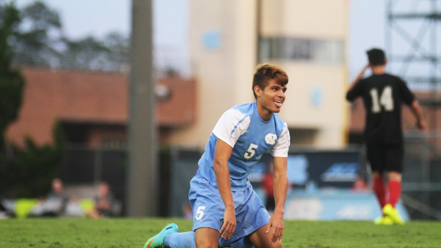 UNC forward, Alan Winn, smiles after a near miss on goal during the first half.  He finished with a goal by match end.  UNC defeated Gardner-Webb 7-0 Friday night at Fetzer field in an exhibition game.
