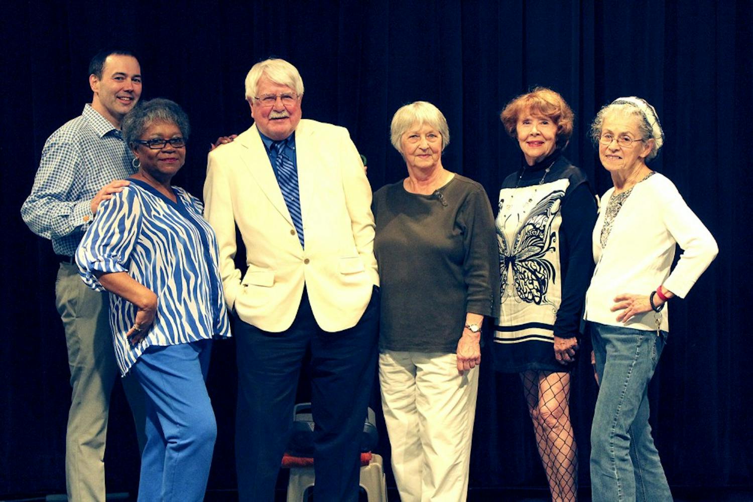 Participants in the Fashion Show at the Seymour Senior Center pose for a picture after a dress rehearsal.