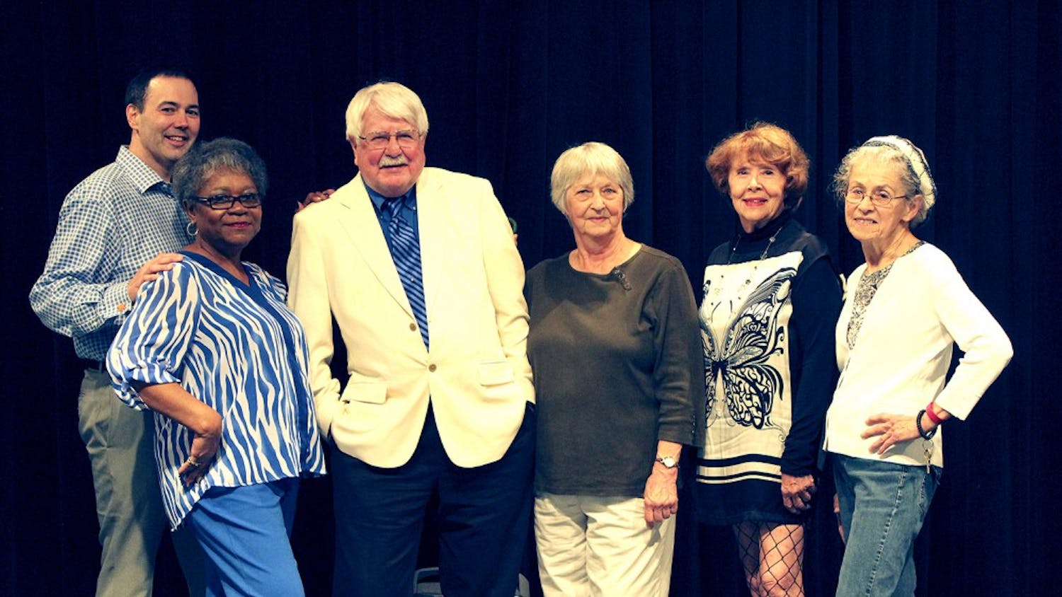 Participants in the Fashion Show at the Seymour Senior Center pose for a picture after a dress rehearsal.