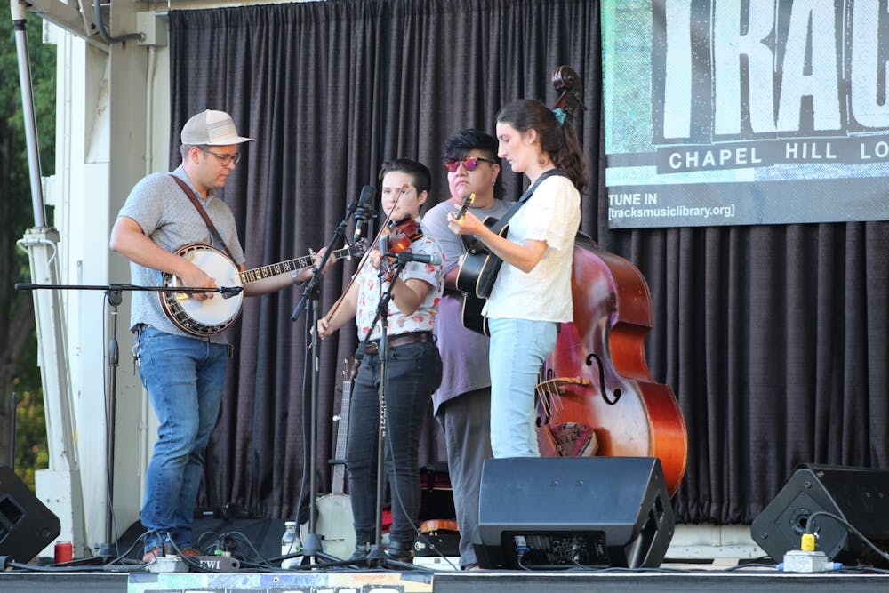 The bluegrass band Hard Drive performs at the Tracks Music Series concert on September 9th, 2021. The Tracks Music Series is a free event that takes place every Thursday evening during September at University Place and features local Chapel Hill musicians.