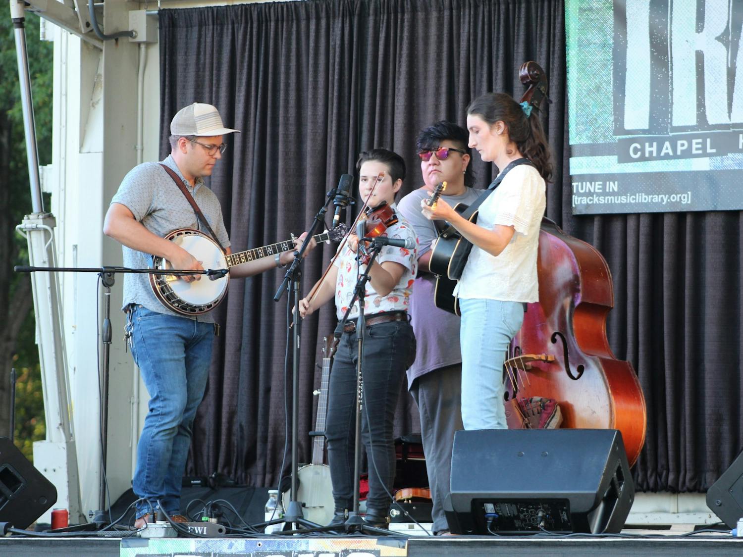 The bluegrass band Hard Drive performs at the Tracks Music Series concert on September 9th, 2021. The Tracks Music Series is a free event that takes place every Thursday evening during September at University Place and features local Chapel Hill musicians.