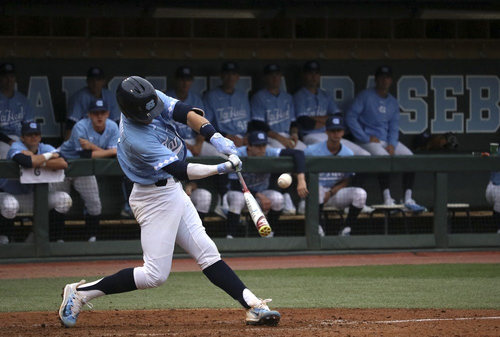 North Carolina shortstop Logan Warmoth (7) swings at a pitch against Gardner-Webb on February 22.