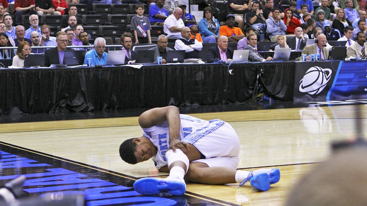 Sophomore forward Kennedy Meeks injures his knee toward the end of the second half during Saturday's win over Arkansas.