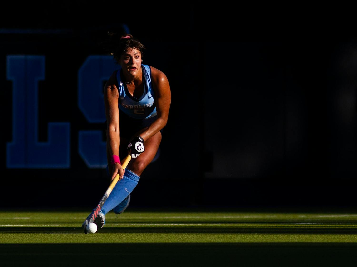 UNC senior forward Meredith Sholder (2) prepares to carry the ball down the field during the Tar Heels' home matchup against Boston College at Karen Shelton Stadium on Sept. 24, 2021. The Tar Heels won 6-1. 