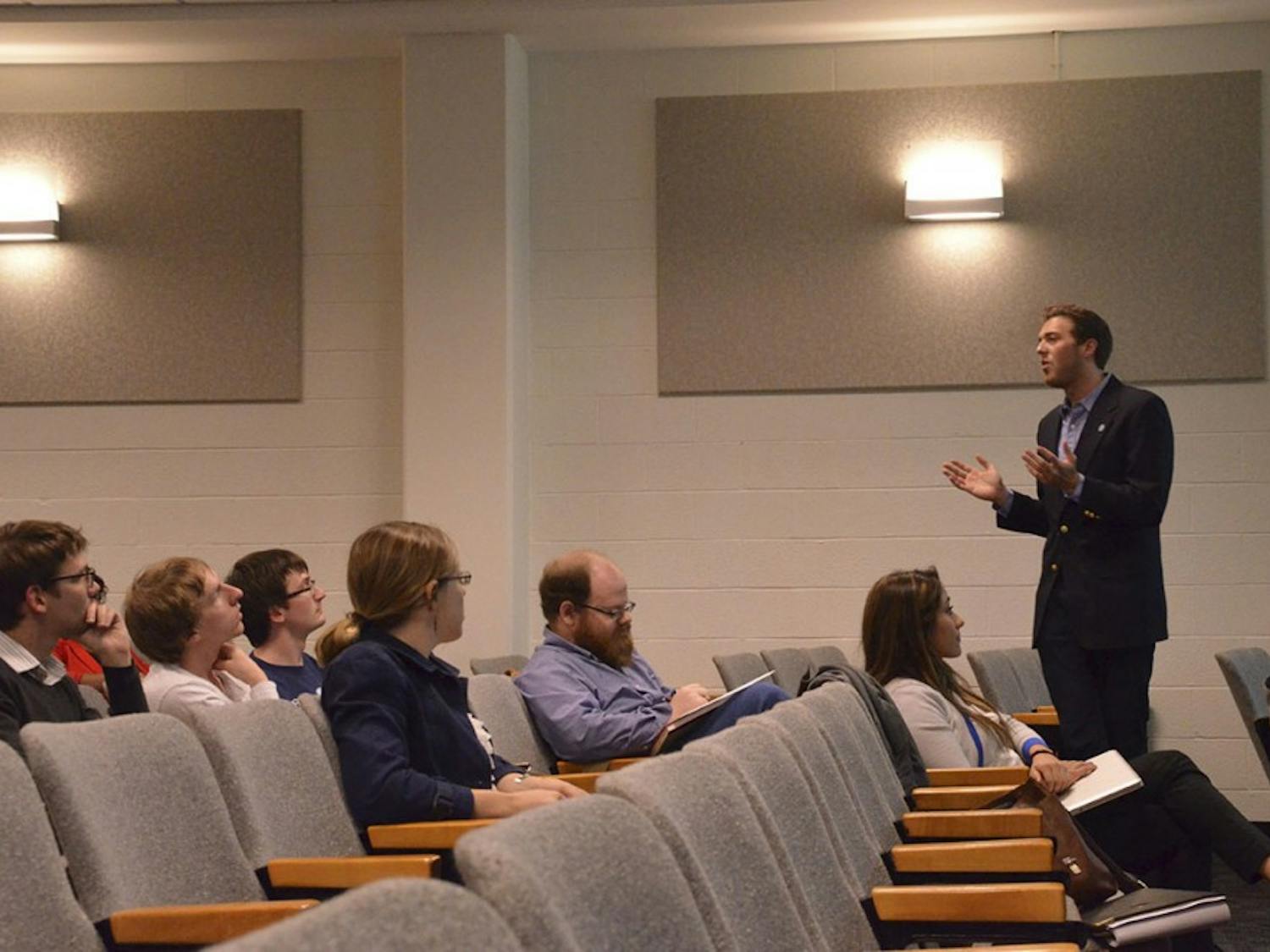 Dylan Russell, president of the Graduate and Professional Student Federation, updates members on their proposed separation from Student Congress on Tuesday in Rosenau Hall at the Gillings School of Global Public Health.