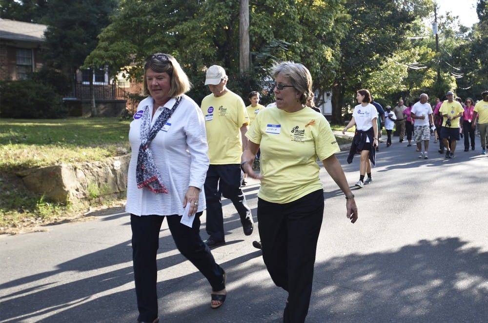 Mayor of Chapel Hill, Pam Hemminger and Mayor of Carrboro, Lydia Lavelle lead a walk around the neighborhood at the good neighbor block party at Hargraves Community Center on Tuesday evening. 