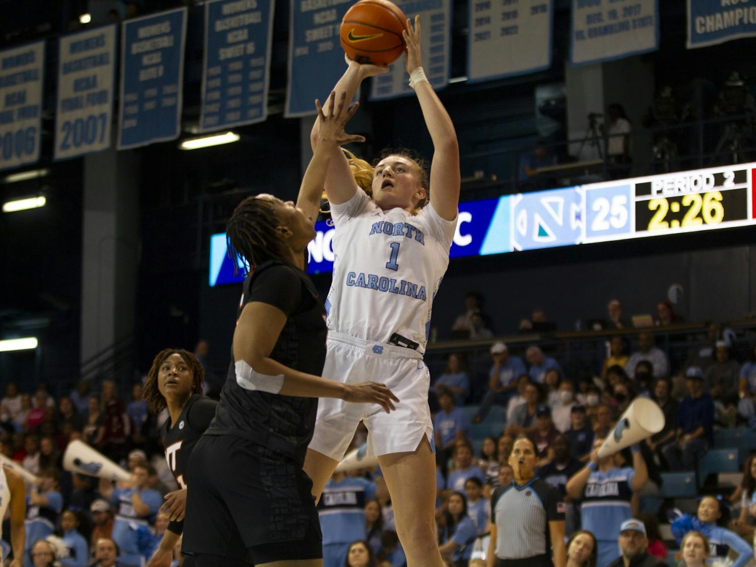 Junior forward/guard Alyssa Ustby (1) takes a jump shot during the women's basketball game against Virginia Tech on Thursday, Feb. 23, 2023, at Carmichael Arena. VT beat UNC 61-59.