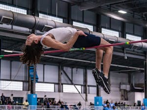 Redshirt junior Draven Crist competes in the high jump event at the Dick Taylor Carolina Cup in the Eddie Smith Field House on Saturday, Jan. 12 2019.