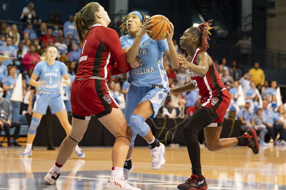 UNC junior guard Kennedy Todd-Williams makes a break towards the basket after stealing the ball from NC State during the game at Carmichael Arena on Sunday, Jan. 15, 2023. UNC won 56-47.