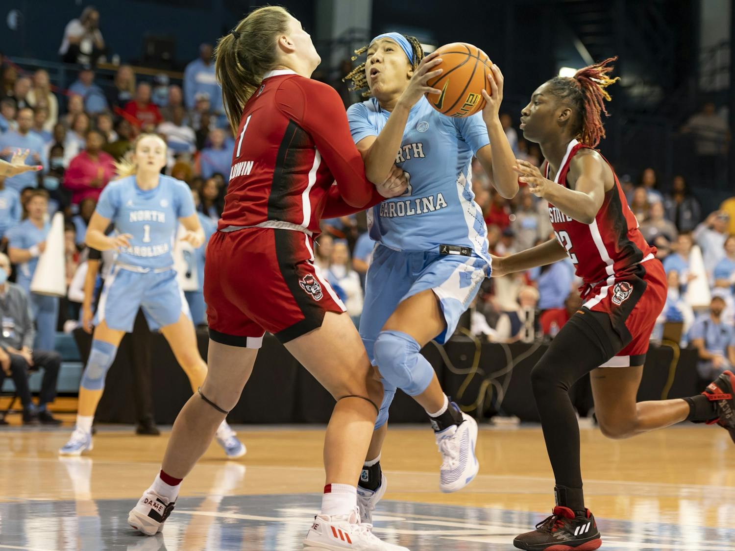 UNC junior guard Kennedy Todd-Williams makes a break towards the basket after stealing the ball from NC State during the game at Carmichael Arena on Sunday, Jan. 15, 2023. UNC won 56-47.