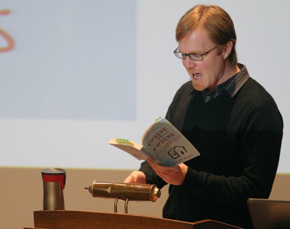 Writer and conservationist Bill Powers reads from his book “Twelve By Twelve” during his presentation on Wednesday night in Hanes Art Center.