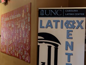 A mural sits between offices and workrooms at the new Carolina Latinx Center, located inside Abernethy Hall.&nbsp;