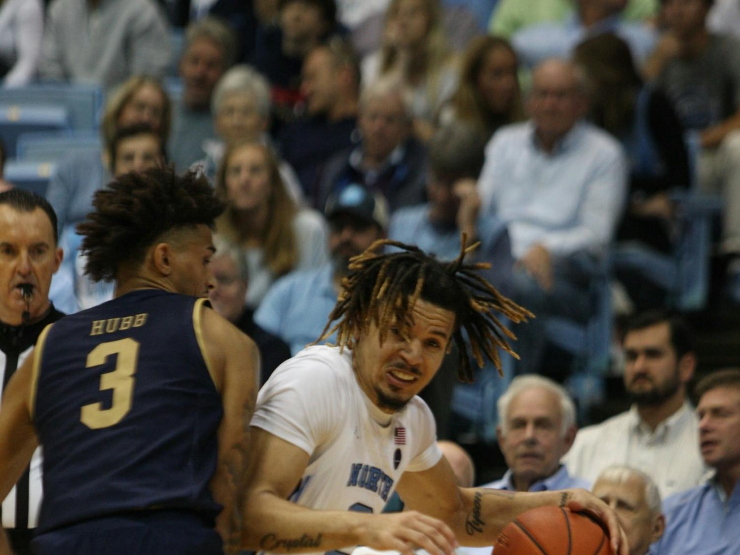 UNC guard Cole Anthony (2) drives past Notre Dame's Prentiss Hubb (3) on Nov. 6, 2019 in the Dean E. Smith Center. Anthony finished the game with 34 points and 11 rebounds. The Tar Heels beat the Fighting Irish 76-65.