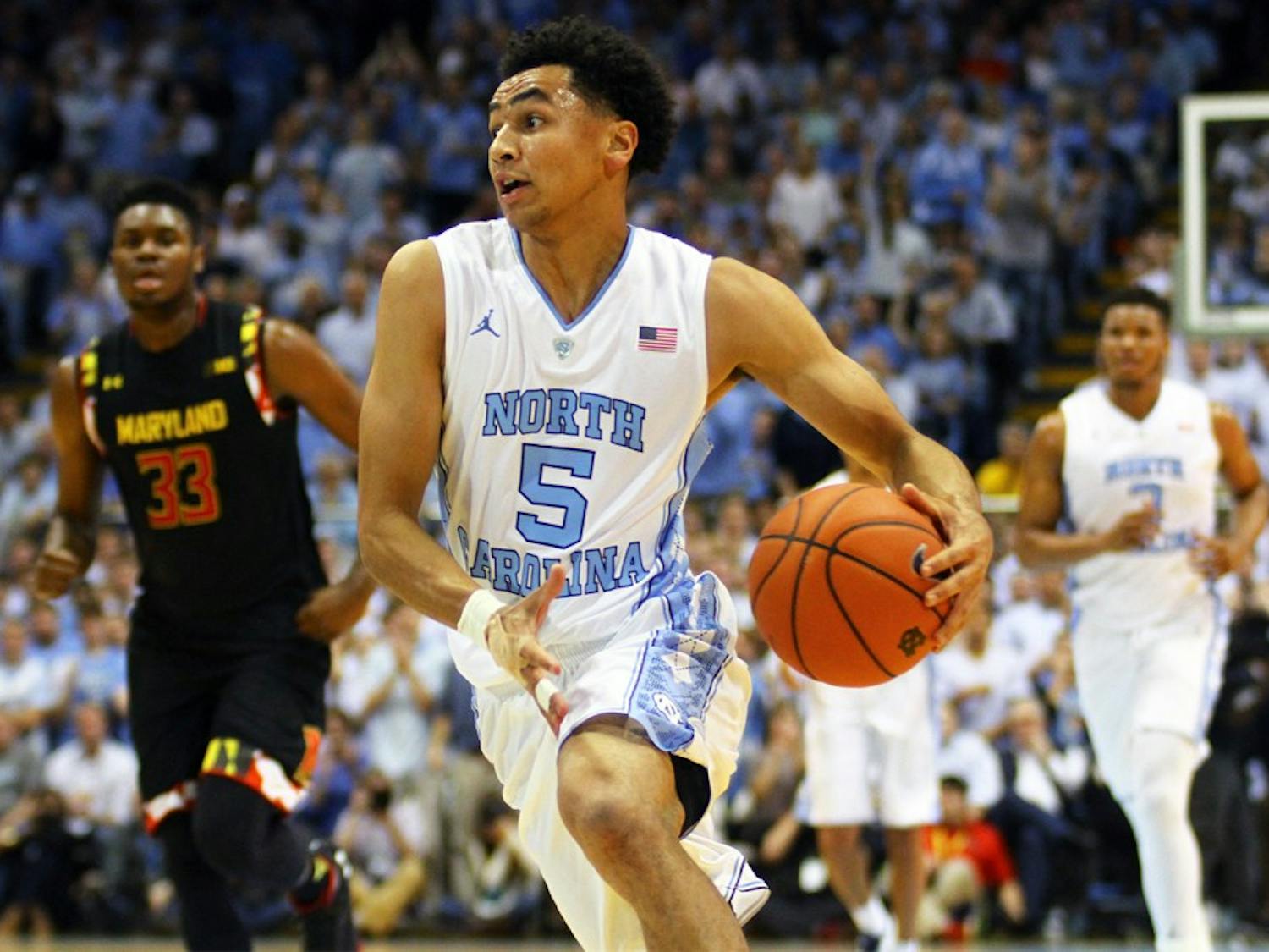 Senior guard Marcus Paige (5) drives the ball towards the basket. This was Paige’s first game back after suffering a fracture to his non-shooting hand.