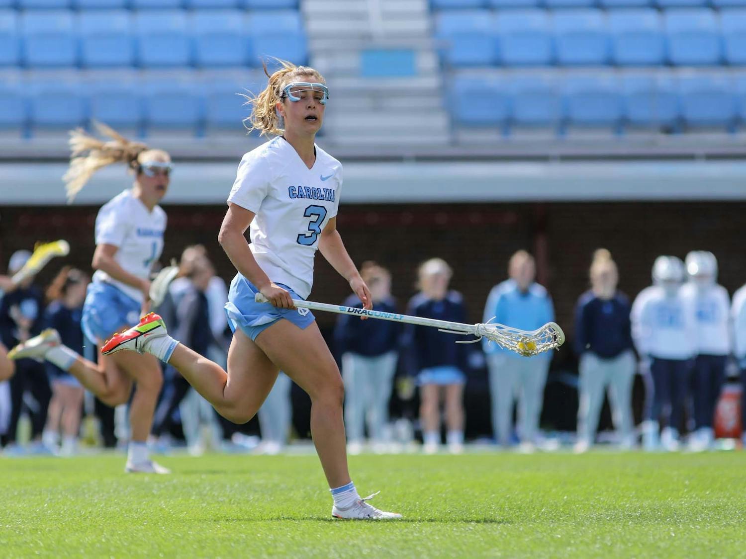 DTH File. UNC fifth-year attacker Jamie Ortega (3) carries the ball downfield against Virginia Tech on Saturday, March 26, 2022, at Dorrance Field. UNC won 20-8.