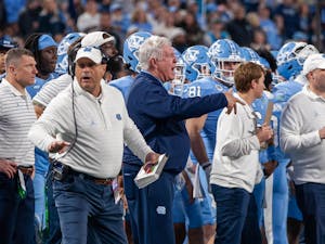 UNC head football coach Mack Brown directs from the sidelines during the 2022 Subway ACC Football Championship Game against Clemson to begin at the Bank of America Stadium on Saturday, Dec. 3, 2022. UNC fell to Clemson 39-10.