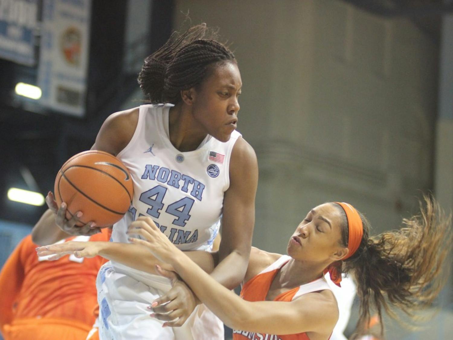 Forward Janelle Bailey (44) snags a rebound during Thursday night's game against Clemson in Carmichael Arena.&nbsp;