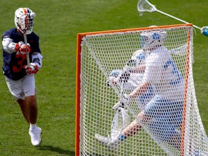 UVA senior attackman Ian Lavaino (3) attempts a shot during an 18-16 win over UNC at Dorrance Field on April 10, 2021.