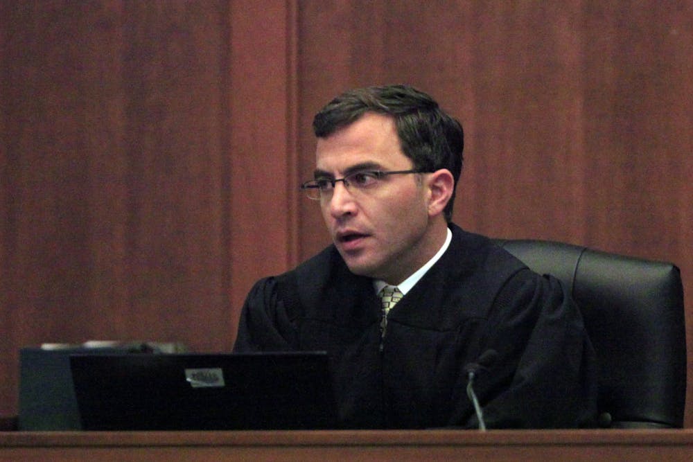 <p>Orange County Superior Court Judge Allen Baddour gives the sentence to Laurence Alvin Lovette Jr., who was found guilty of kidnapping, robbing and murdering Eve Carson, the 2008 University of North Carolina-Chapel Hill student body president. Baddour handed down the sentence on Tuesday, Dec. 20, 2011, in Hillsborough. Lovette will serve a life-prison sentence without the possibility of parole. (Takaaki Iwabu/Raleigh News &amp; Observer/MCT)</p>