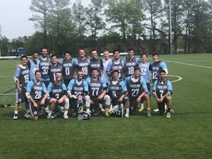 The UNC club lacrosse team poses after a win against Duke in 2018. UNC won 7-5.
Photo courtesy of Jackson Ozello.