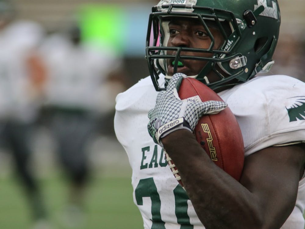 Eastern Michigan running back Bronson Hill scores the lone EMU touchdown in the Eagles 51-7 loss to Western Michigan Saturday afternoon in Kalamazoo.
