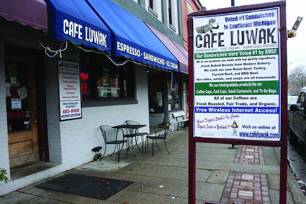 Cafe Luwak will stay open for another year while owner Jim Karnopp looks for a business partner to run the cafe.
