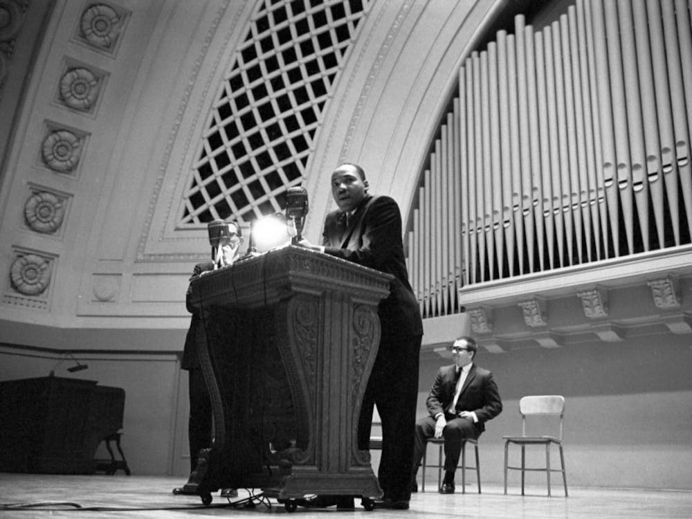 Martin Luther King at podium, Hill Auditorium, November 11, 1962. Accessed from University of Michigan Bentley Historical Library.