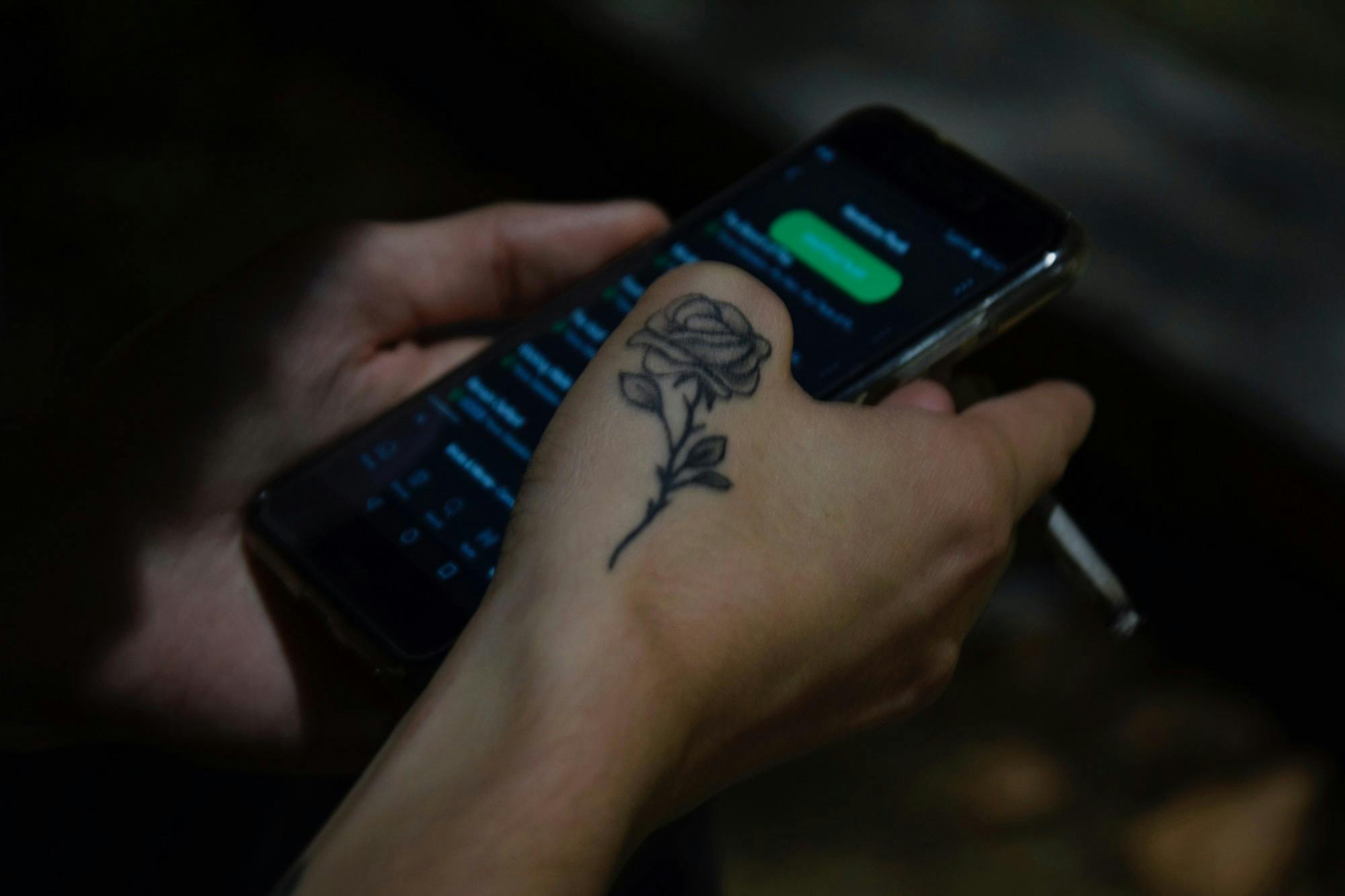 Person scrolling through their Spotify