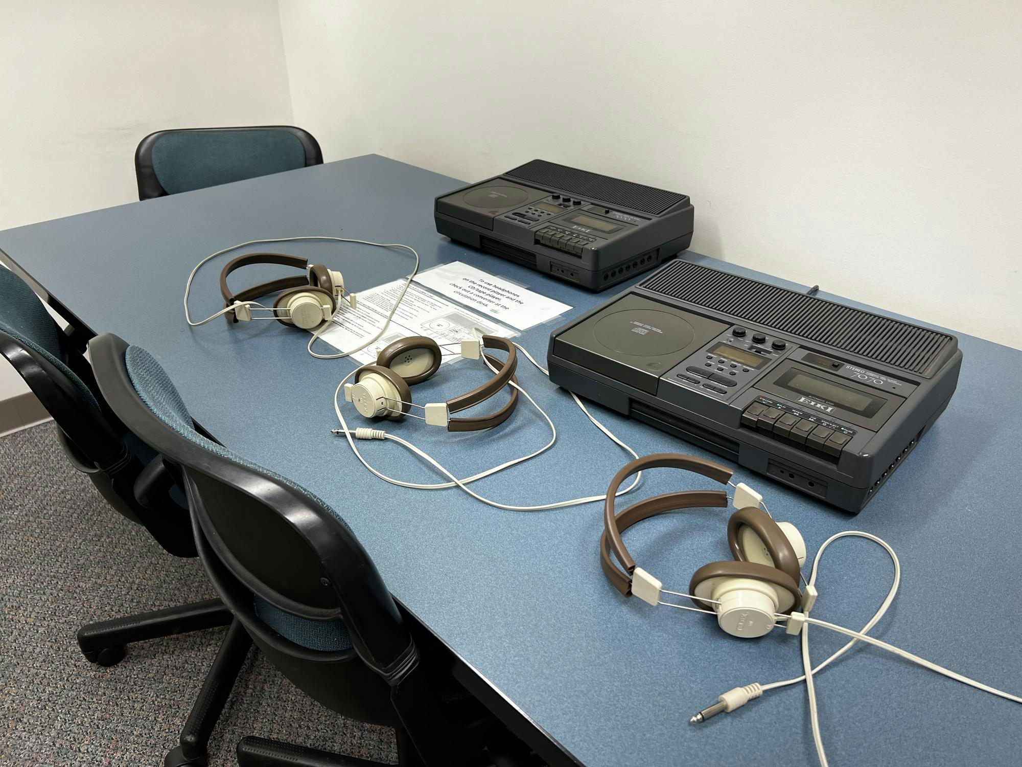 Two machines for playing audio in Halle Library. They have the capacity to play cassette tapes and CDs.