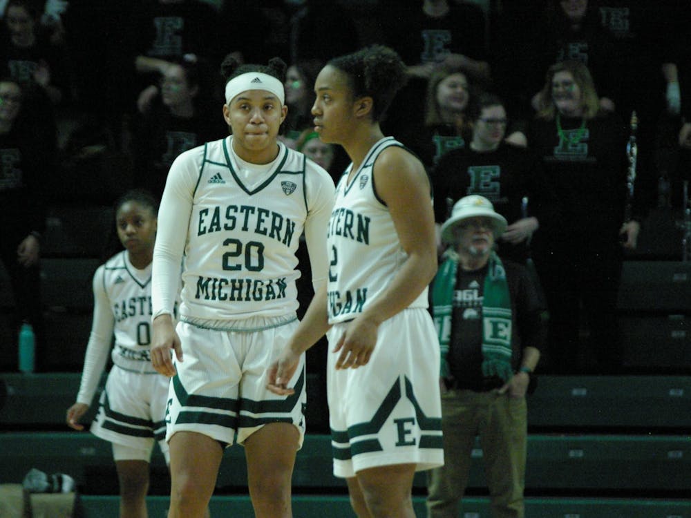 Corrione Cardwell and Juanita Agosto wait during an inbounds at the Convocation Center on Jan. 22.