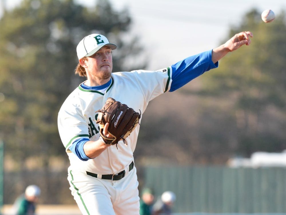 EMU Pitcher Paul Shaak, throws the ball to first base during the EMU vs. MSU baseball game on April 1st, 2014 at Oestrike Stadium.