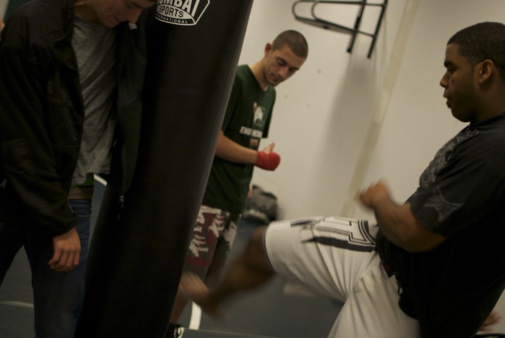 Eastern Michigan University students began the MMA student organization in 2006, after being a part of Detroit MMA for a year prior. 