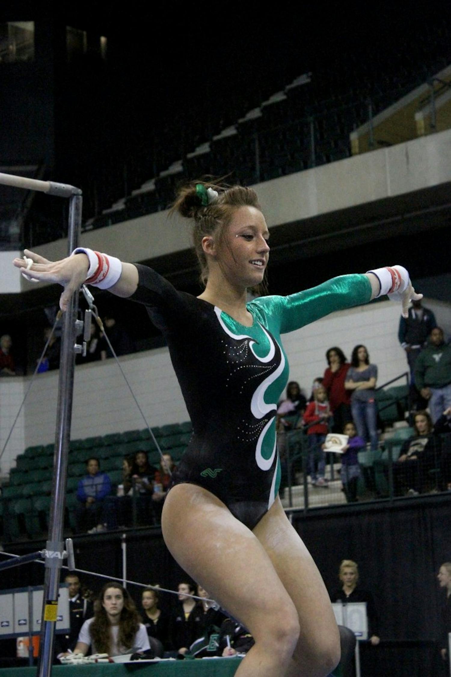 Anna Willette competes on uneven bars during the MAC Conference Championships at Eastern Michigan University’s Convocation Center in Ypsilanti on Saturday, on March 22, 2014.