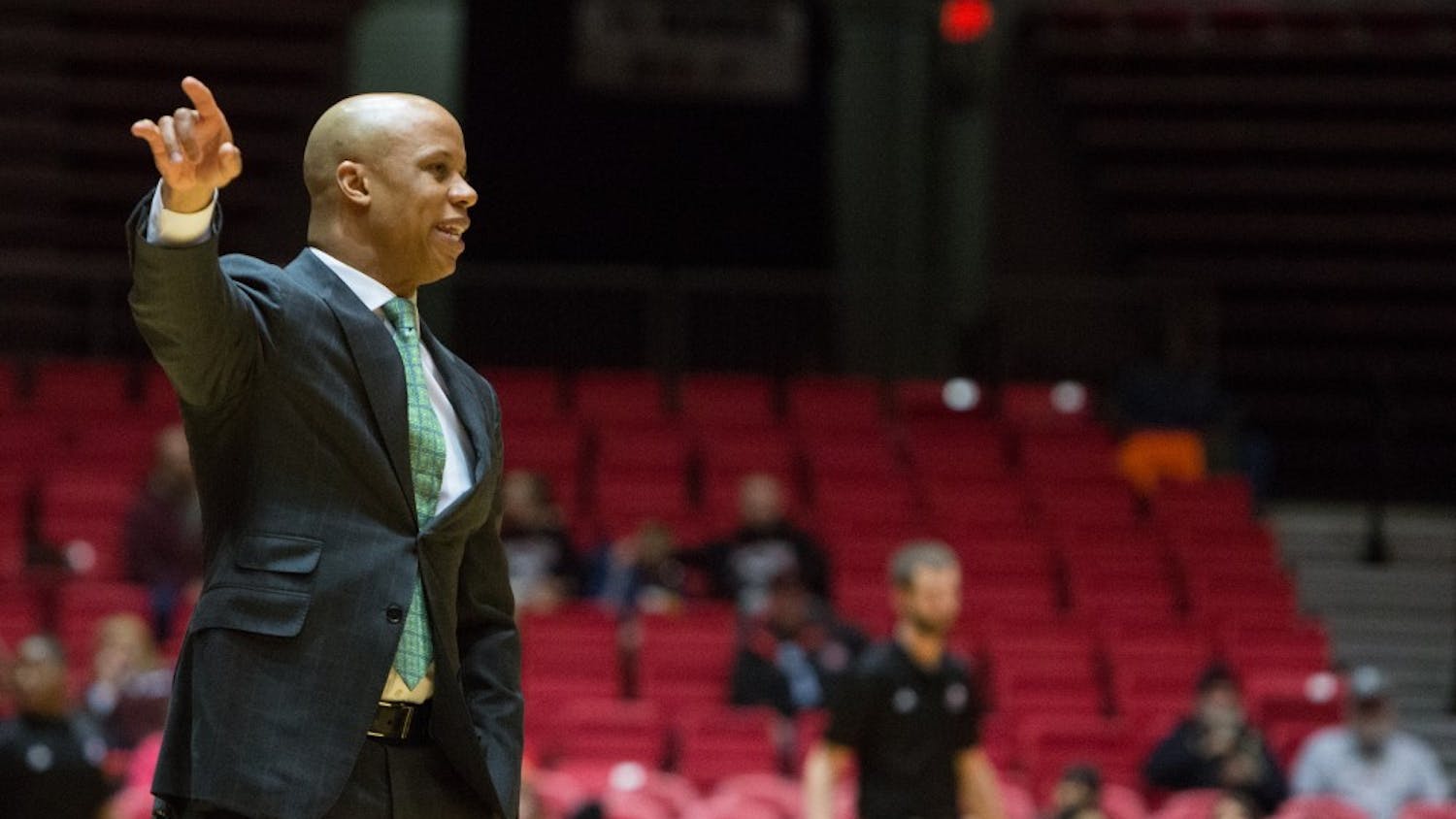 Eastern Michigan head coach Rob Murphy calls out the play in the Eagles 61-59 double overtime loss to Northern Illinois Thursday in Dekalb.