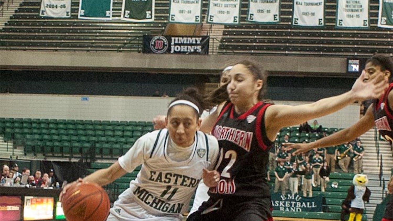 Eastern Michigan guard Desyree Thomas pushes her way around the defense during the Eagles' 76-81 overtime loss to Northern Illinois on 10 March at the Convocation Center.