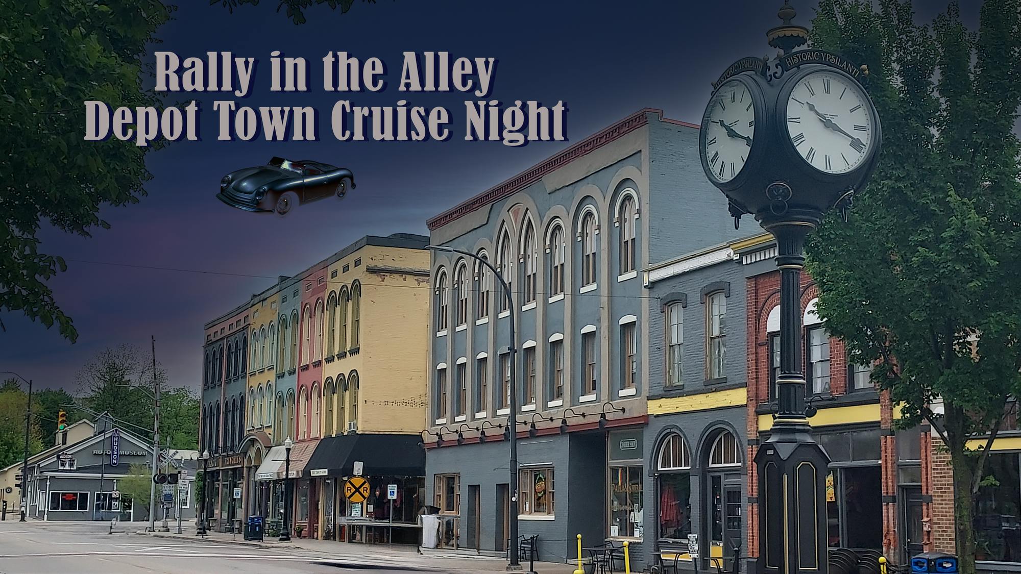 A street view of the buildings in Depot Town, with "Ralley in The Alley, Depot Town Cruise Night" text in the top left corner.