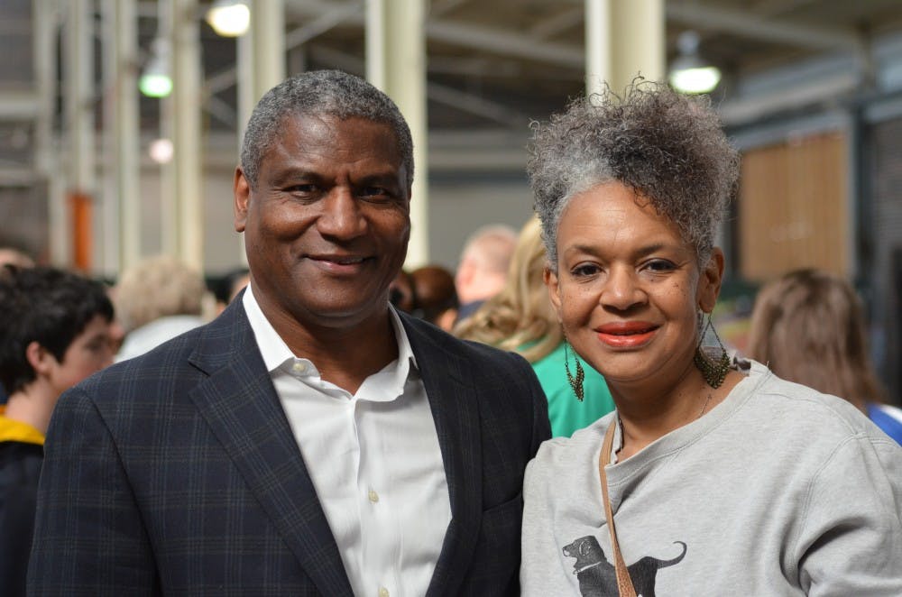 EMU Alumni and former classmates former U.S. Secretary of Transportation Rodney Slater and Karin Brown stop for a photo at True EMU day at Eastern Market.