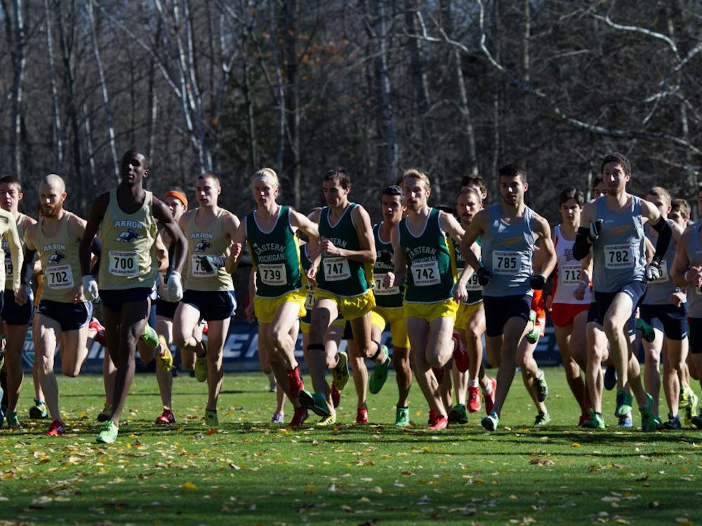 The men’s cross country team starts the race during the MAC Championship meet at Central Michigan University in Mount Pleasant on Saturday, November 1st, 2014.