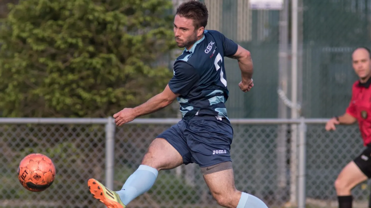 AFC Ann Arbor defenseman Kyle Breitmeyer fires a shot on goal in the first half of Ann Arbor's 4-0 victory over Oakland United FC at Hollway Field on May 15, 2015.