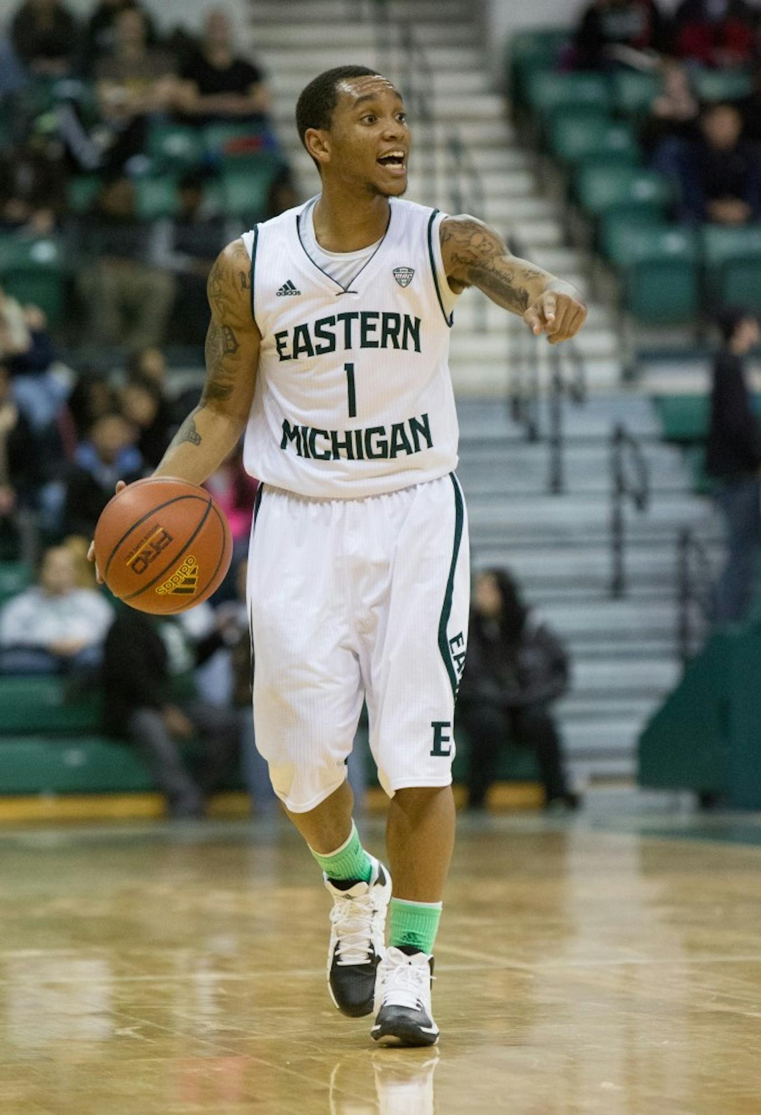 EMU guard Mike Talley (1) sets up the play in Eastern Michigan's 67-58 win over Green Bay Tuesday night. Talley had 11 points and 4 assists.