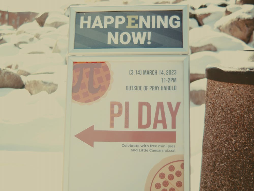 the Pi Day sign outside of pray harold