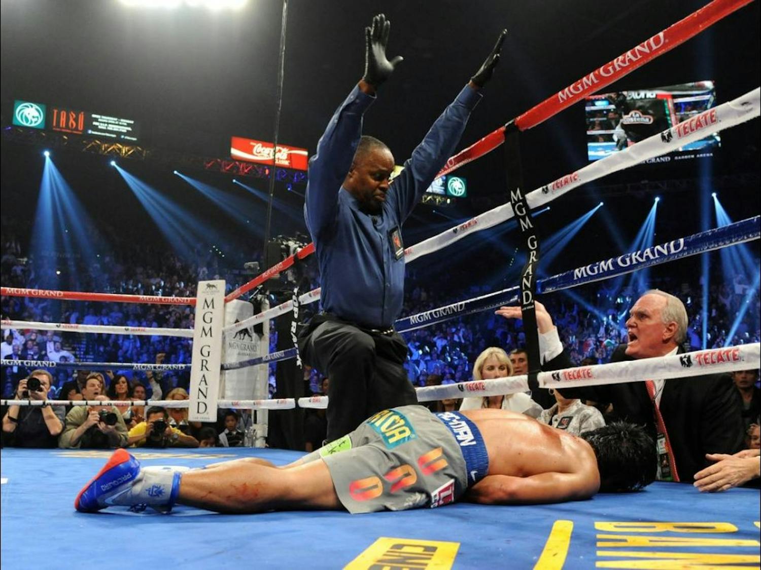 	Manny “Pacman” Pacquiao sprawled out on the canvas following a devastating right hand blow from Juan Manuel Marquez on Saturday.