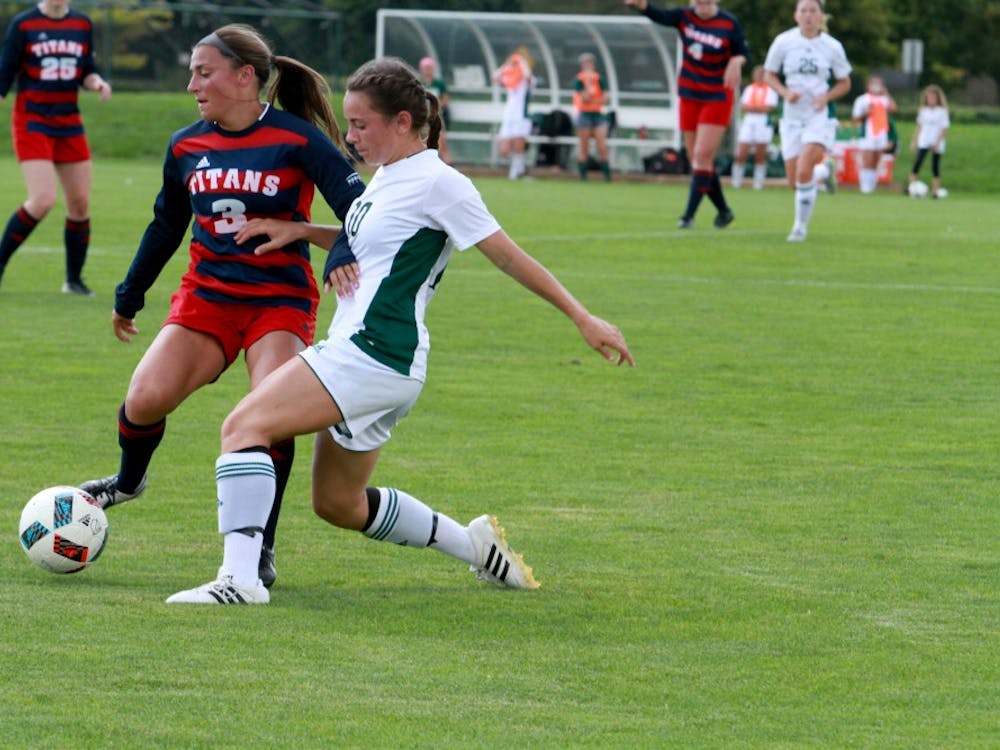 Sabrina McNeill dribbles the ball against Detroit Mercy on Sept. 18. 