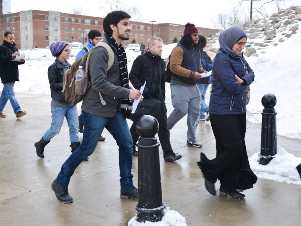 EMU students begin the second walk of the weeklong #Walkwithme protest on Feb 18, 2015 on Eastern Michigan University's campus.