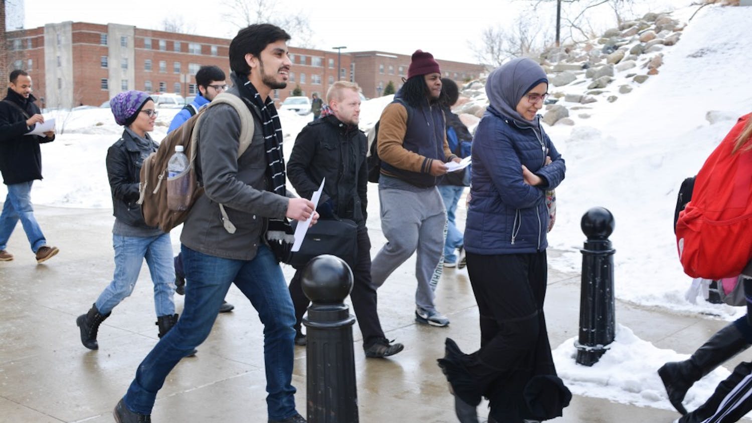 EMU students begin the second walk of the weeklong #Walkwithme protest on Feb 18, 2015 on Eastern Michigan University's campus.