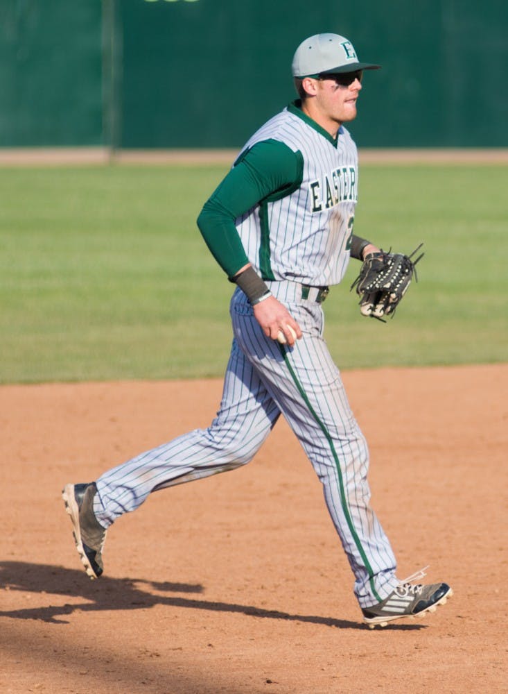 Adam Dennison plays outfield in the tenth inning during the Eastern Michigan vs. Ohio University baseball game at Ohio University in Athens, Ohio on Saturday, April 26, 2014.